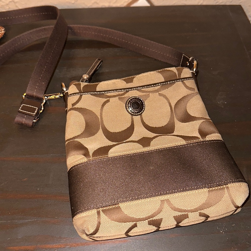 Coach crossbody and wristlet.